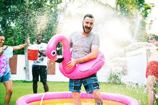 pool party of family in lawn