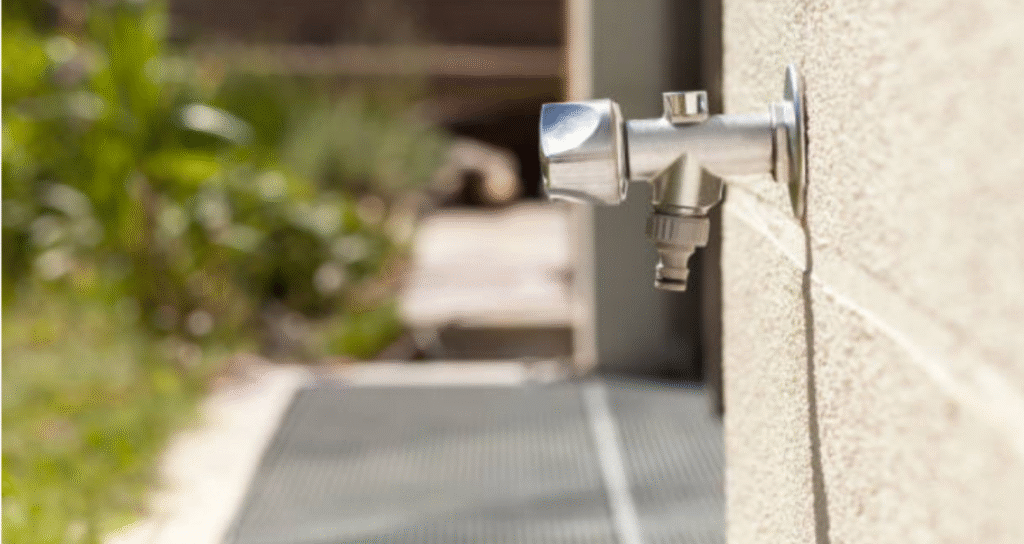 outdoor faucet in backyard