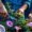 Gardener pruning petunias to encourage fresh blooms