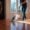 Person using a steam mop on hardwood floors