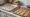 baking sheets and cookie sheets on a kitchen counter