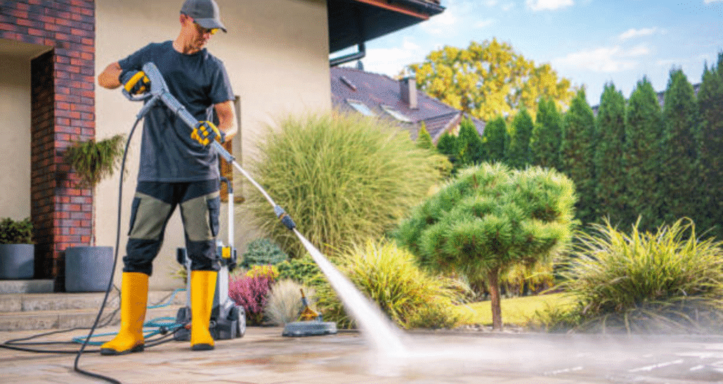 man washing frontyard